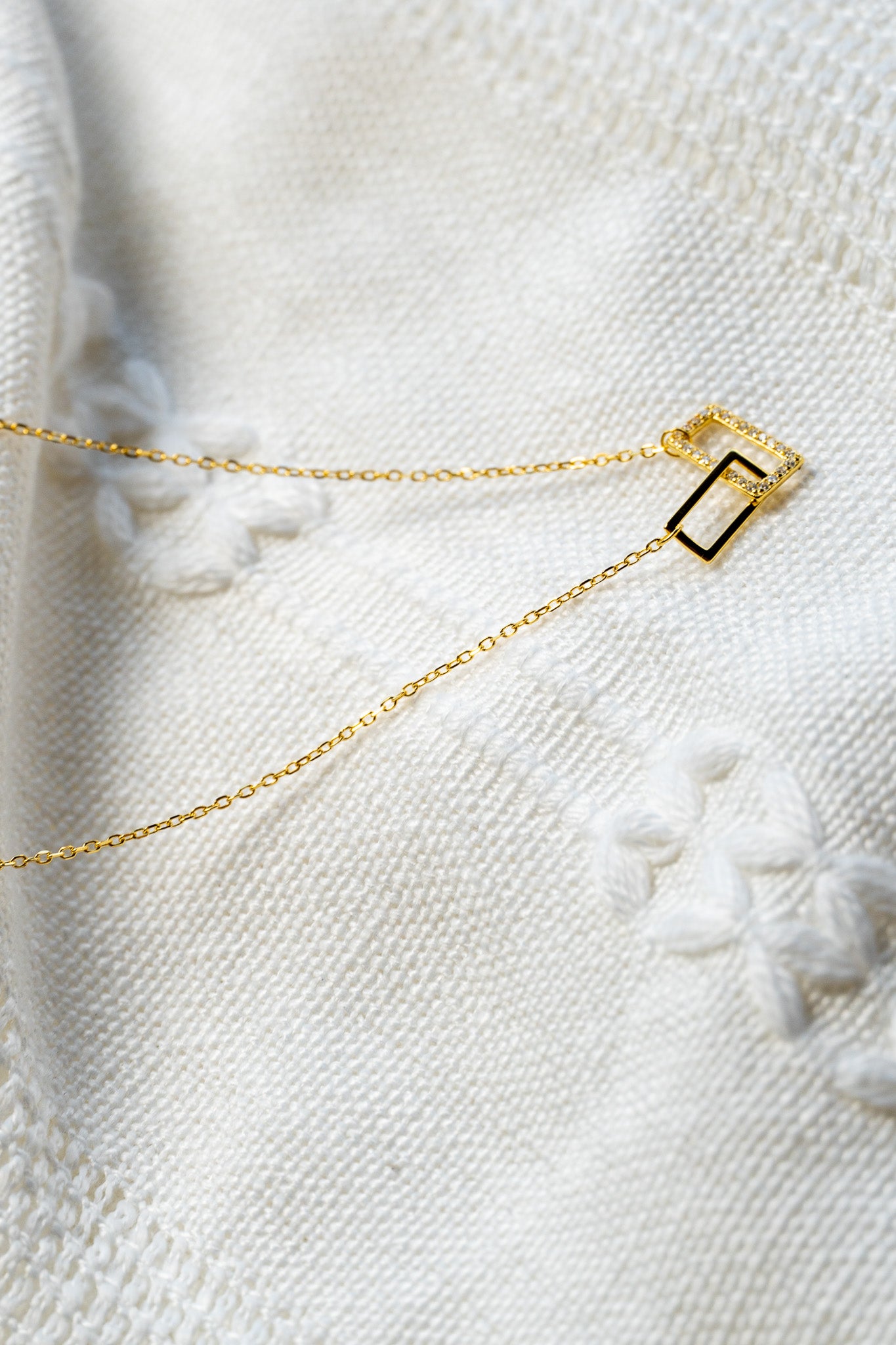 Cubic Zirconia Geometric Crossed Square Necklace