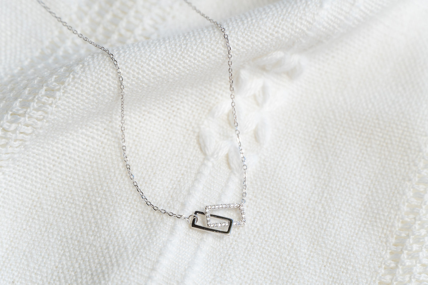 Cubic Zirconia Geometric Crossed Square Necklace