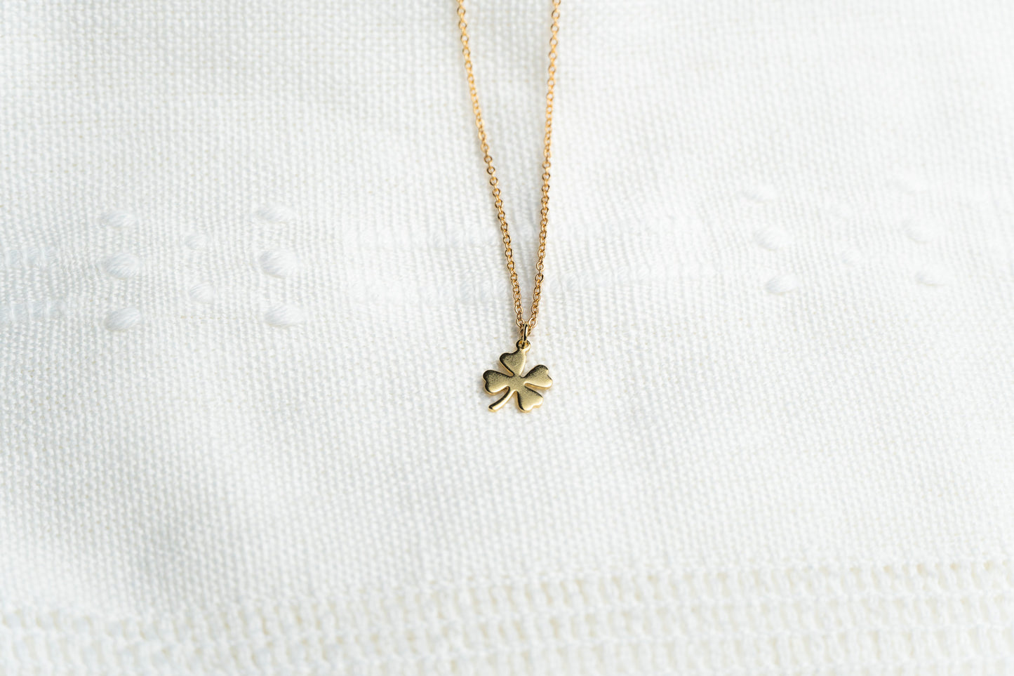 Dainty Gold Four leaf Clover