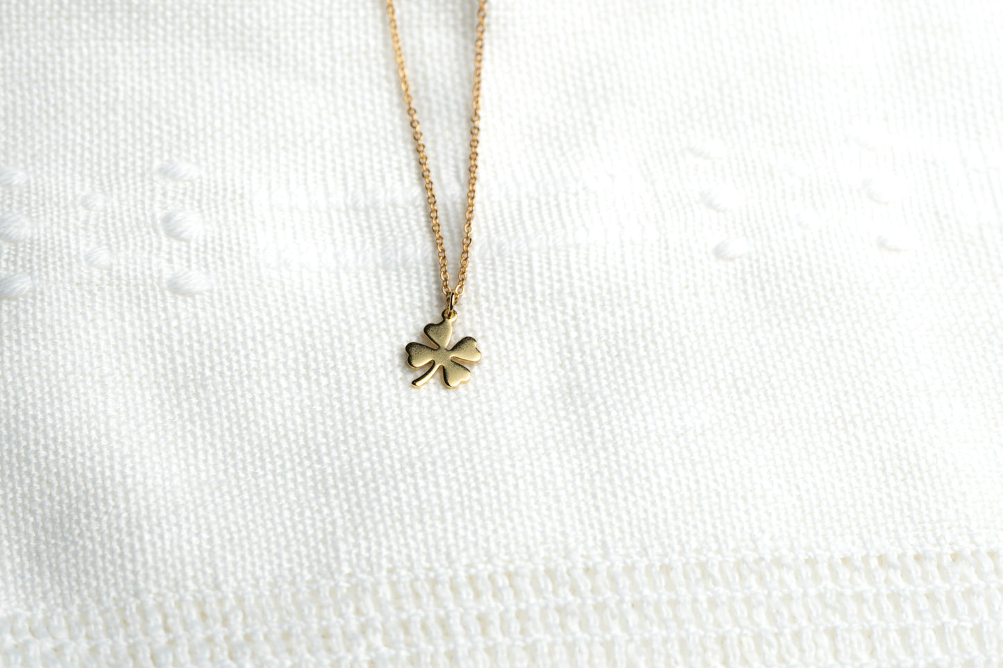 Dainty Gold Four leaf Clover