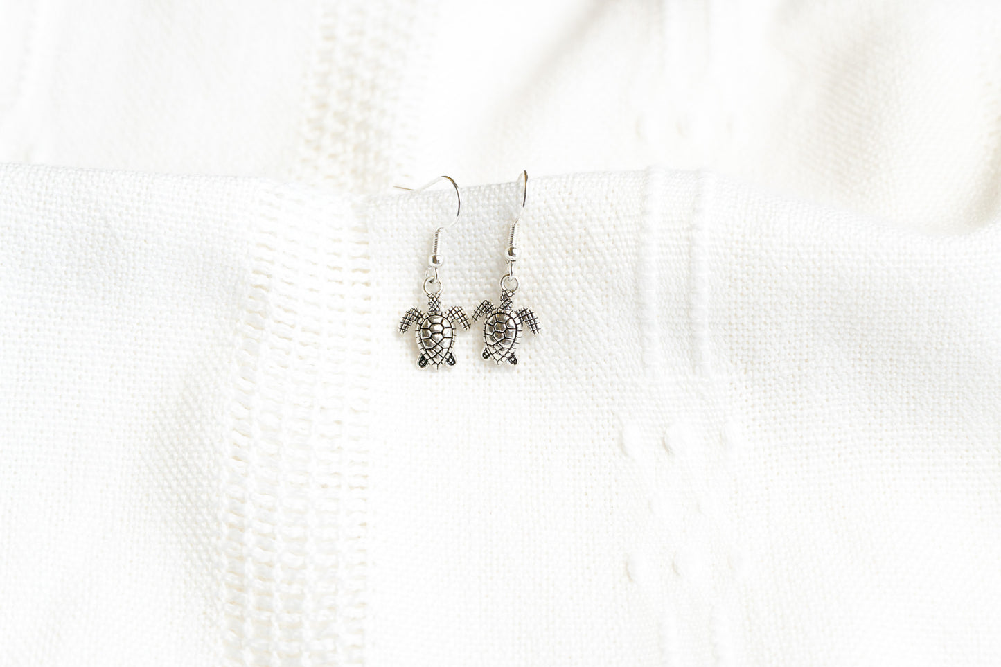 Small turtle dangle earrings