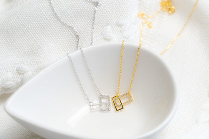 Cubic Zirconia Geometric Crossed Square Necklace