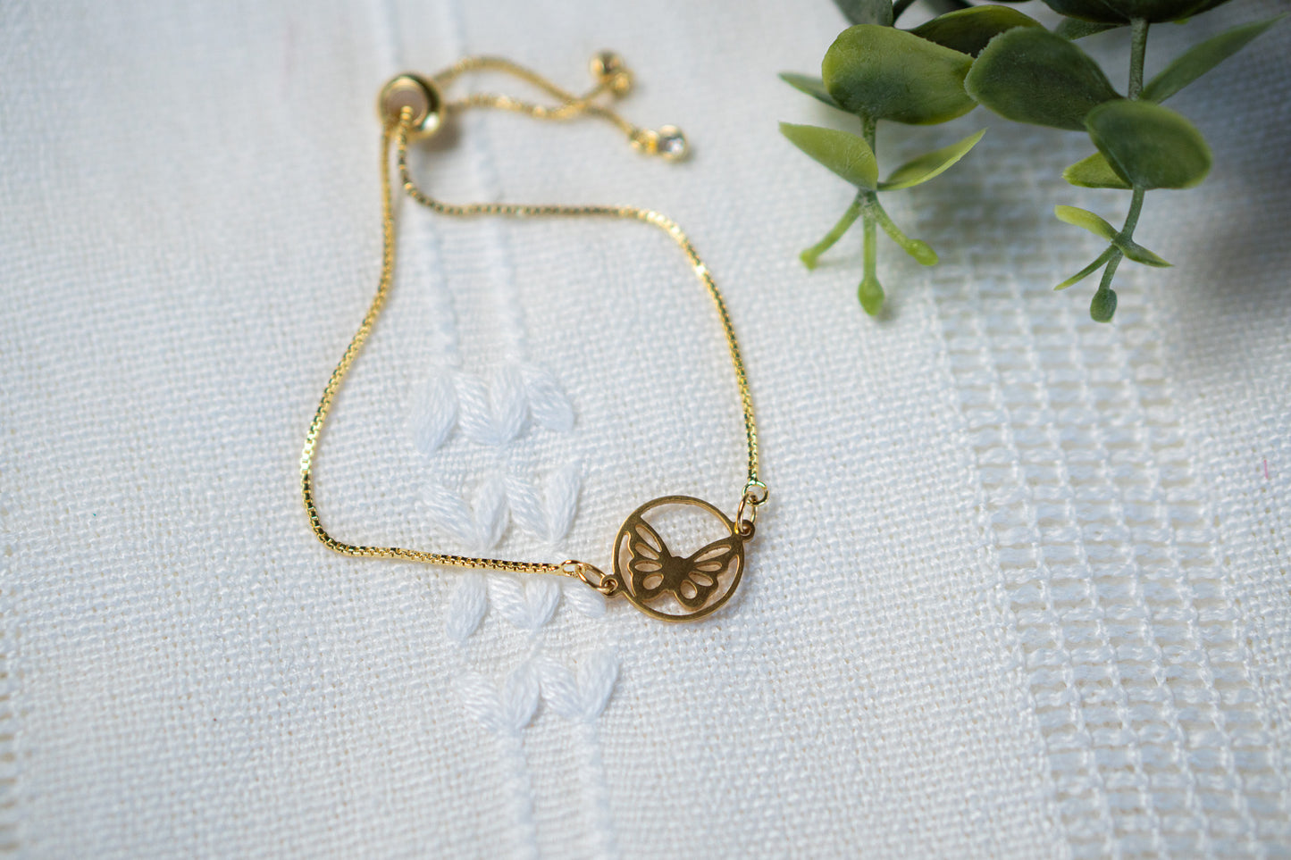 Gold Butterfly in a circle Bracelet