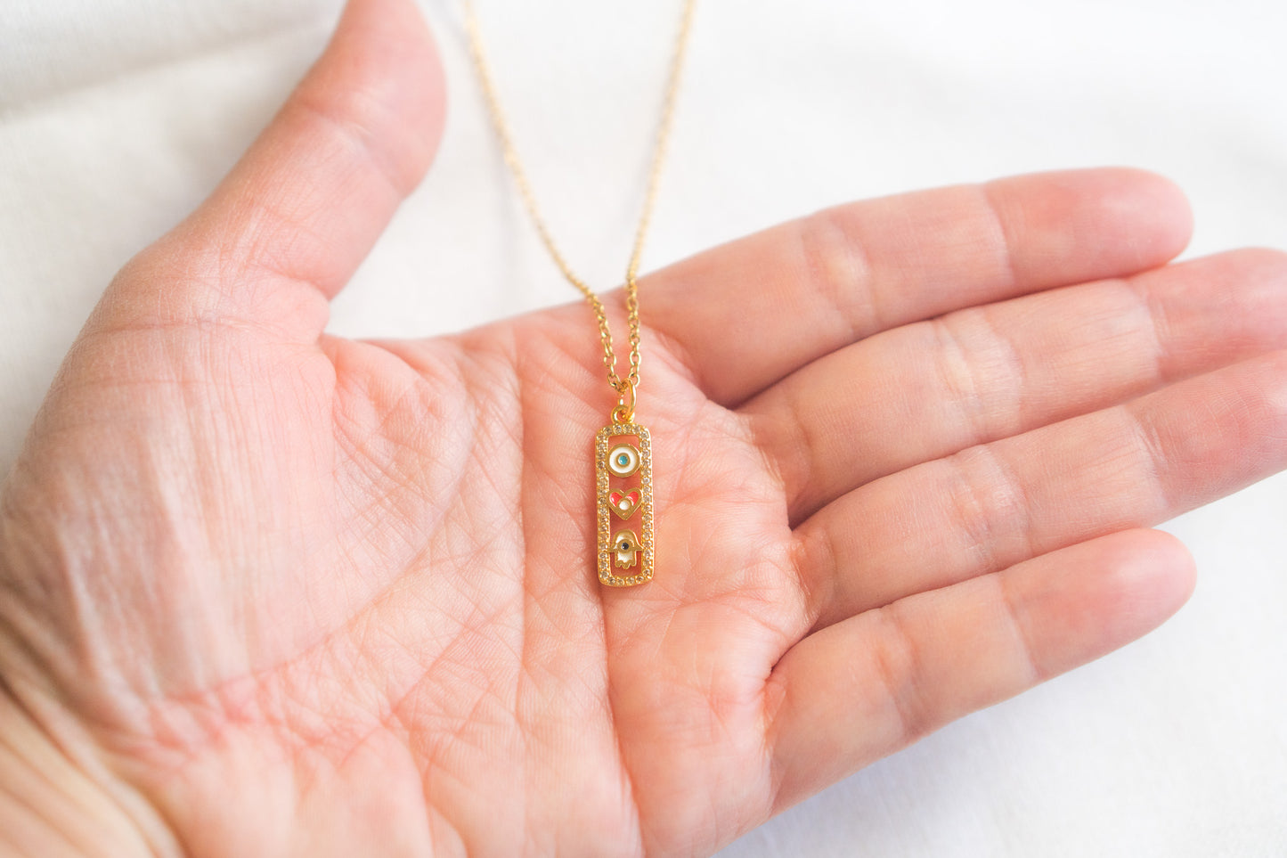 Small Gold Hamsa Hand Heart in Rectangle Necklace