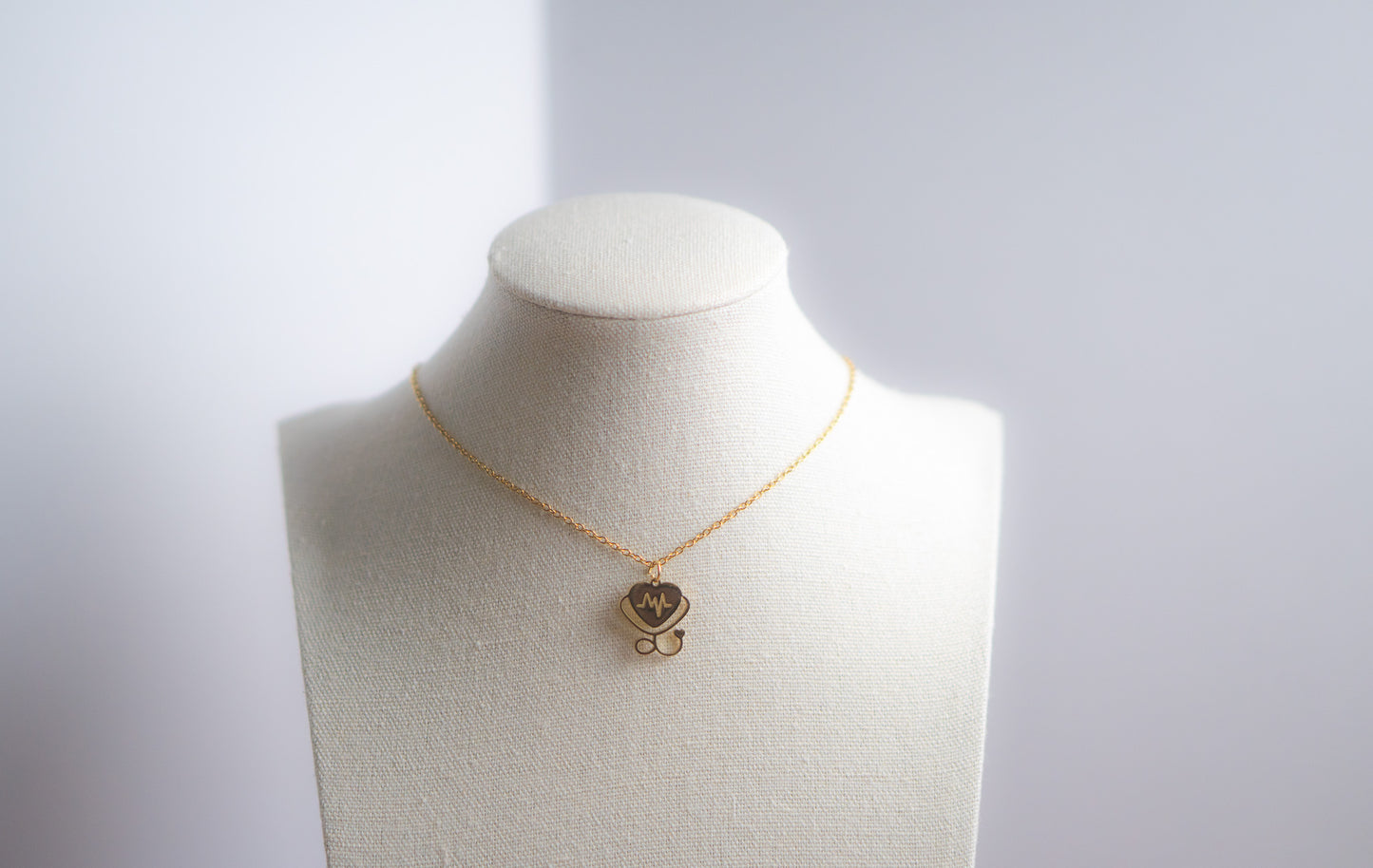 Gold Stethoscope Heart Necklace